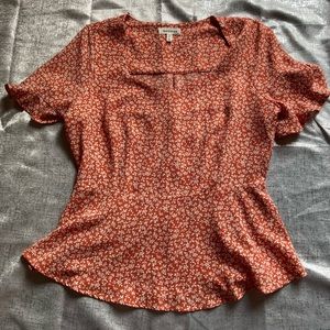 Monteau peplum top
